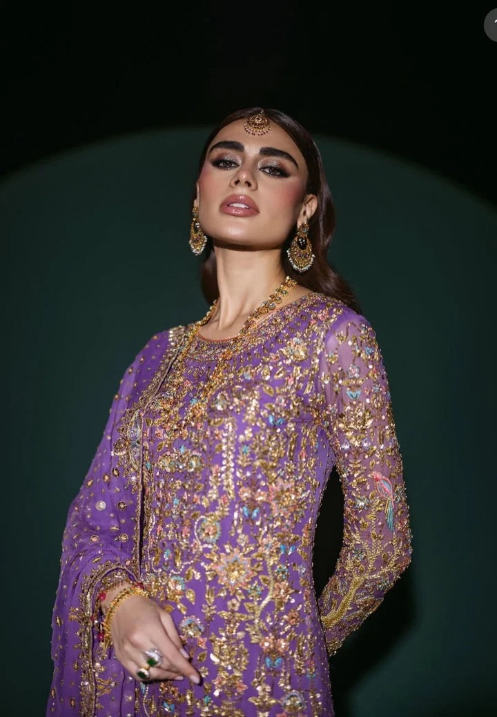 Nomi Ansari Couture pakistani fashion outfit in purple tones.